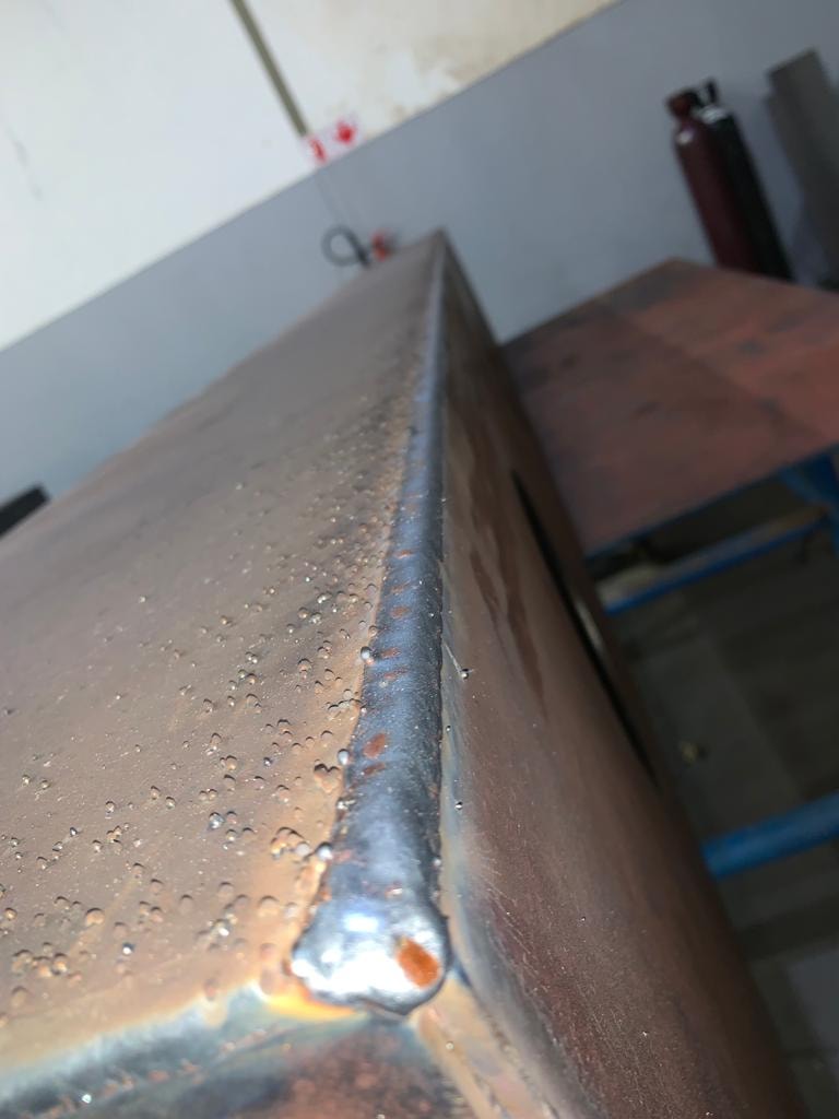 Precision weld — structural steel fabrication for mine workshop