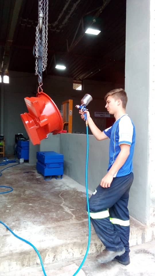 Hydraulic pump component — surface preparation and spray-paint finishing before dispatch